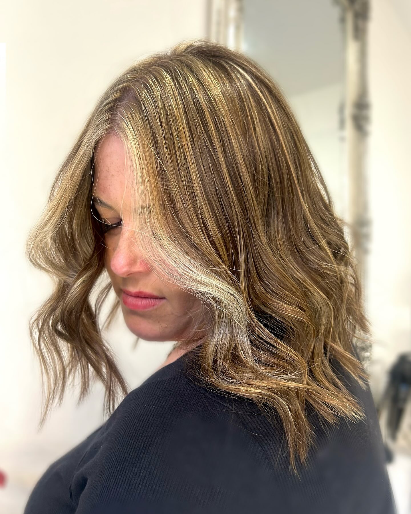 Bronde balayage long bob with texture and movement.