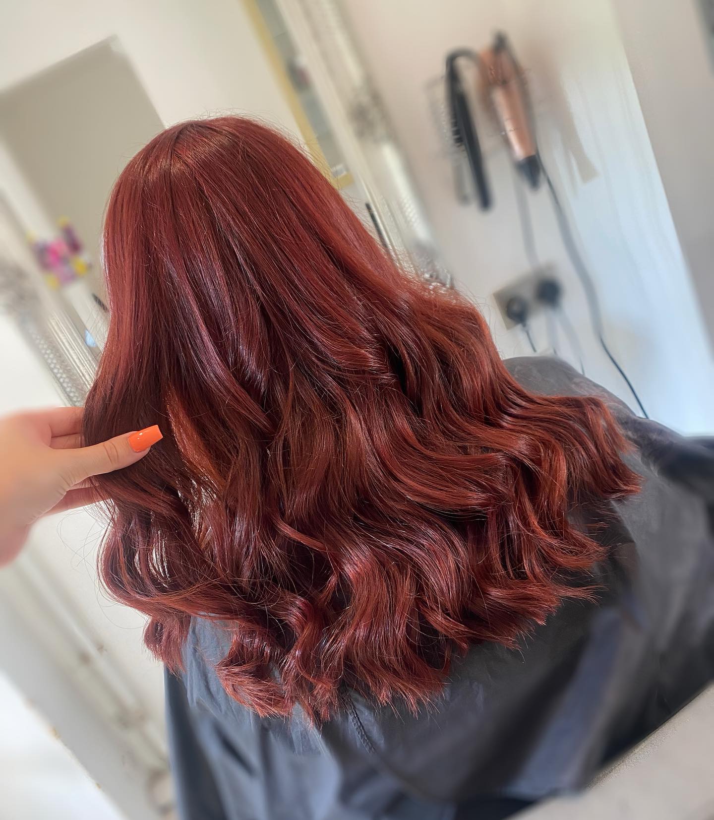 Rich red hair colour with shine and dimension.