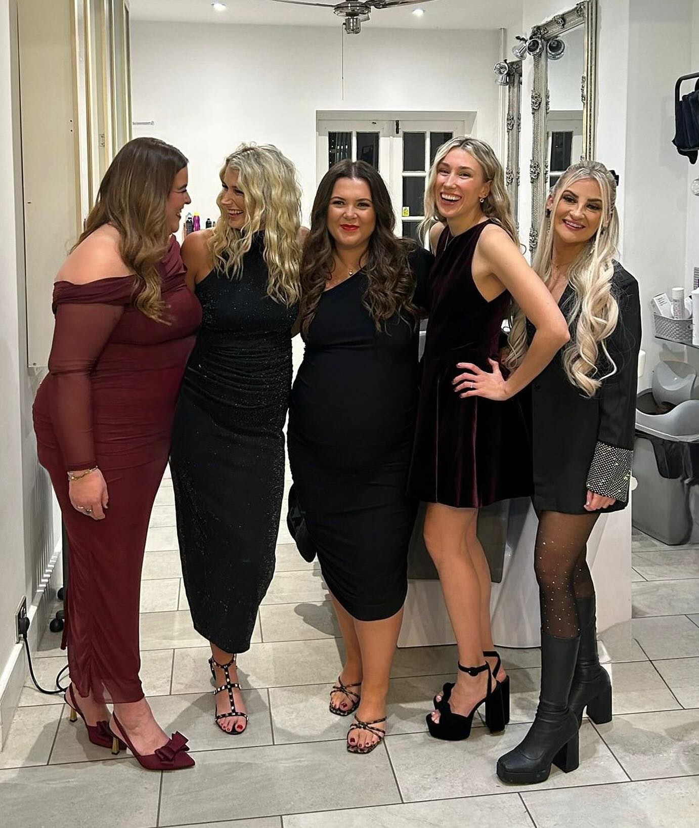 Hair Obsession salon team posing together.